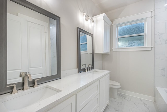 3928 Hogan Dr, Tyler, TX 75709 - bathroom featuring marble look tiles, toilet, baseboards, and double vanity