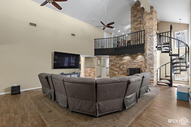 4403 Nassau Dr, Wichita Falls, TX 76308 - living area with a ceiling fan, wood finished floors, stairway, and high vaulted ceiling