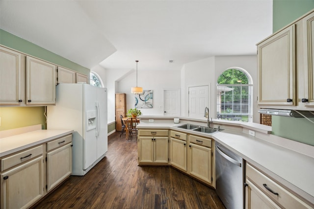 8630 Hidden Spring Dr, Frisco, TX 75034 - kitchen featuring stainless steel dishwasher, white refrigerator with ice dispenser, plenty of natural light, and a sink