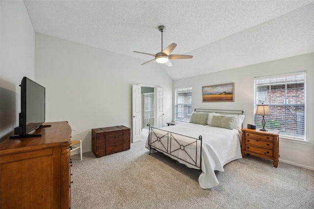 8630 Hidden Spring Dr, Frisco, TX 75034 - bedroom with carpet, vaulted ceiling, baseboards, and ceiling fan