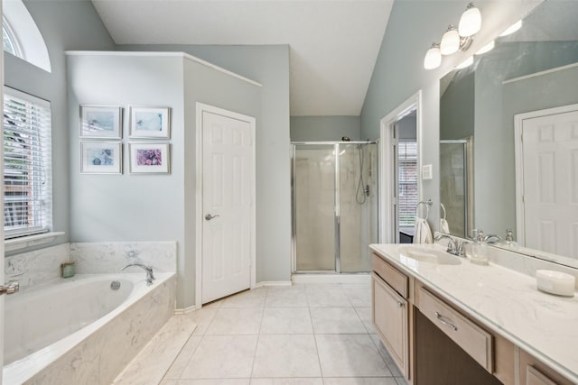 8630 Hidden Spring Dr, Frisco, TX 75034 - bathroom with a stall shower, vanity, a bath, lofted ceiling, and tile patterned flooring