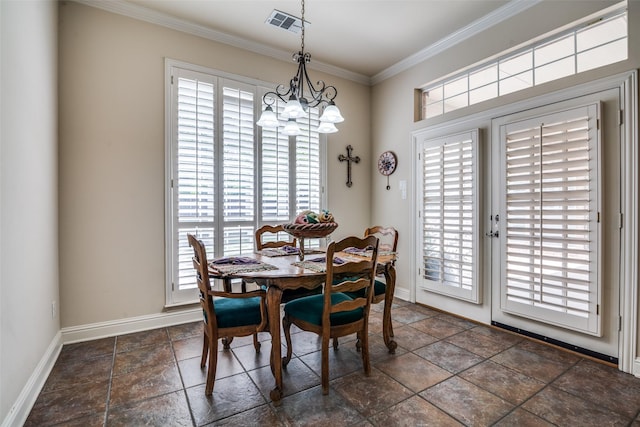 2305 Rosser Ct, Rowlett, TX 75088 - dining room with baseboards, plenty of natural light, crown molding, stone tile floors, and a chandelier