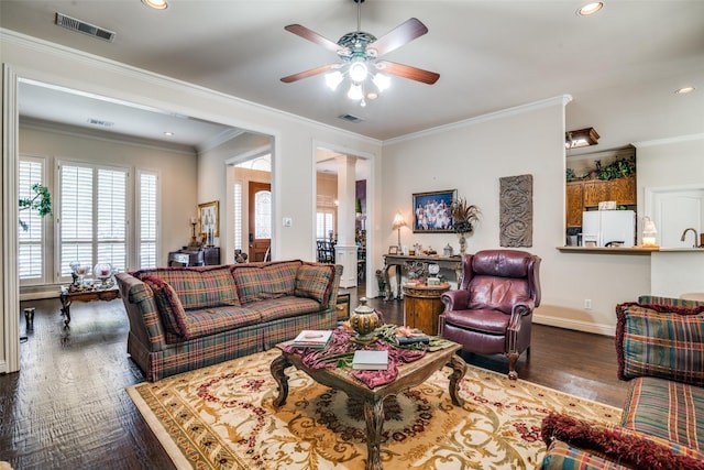 2305 Rosser Ct, Rowlett, TX 75088 - living area with a ceiling fan, recessed lighting, dark wood finished floors, baseboards, and decorative columns