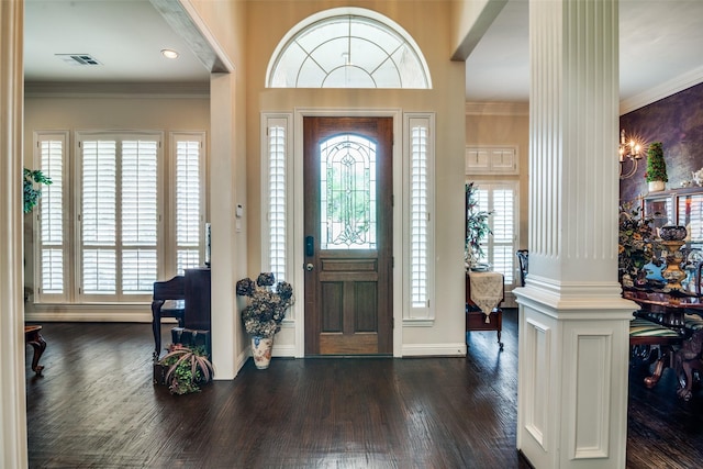 2305 Rosser Ct, Rowlett, TX 75088 - foyer entrance featuring ornate columns, dark wood-style flooring, and ornamental molding