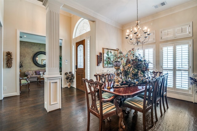 2305 Rosser Ct, Rowlett, TX 75088 - dining area with decorative columns, healthy amount of natural light, crown molding, a chandelier, and dark wood-style flooring