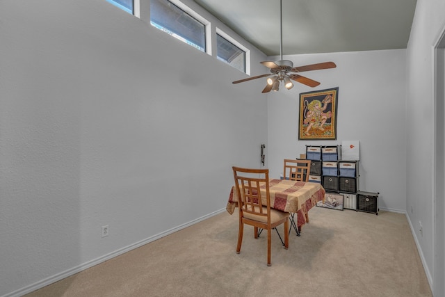 6433 Southpoint Dr, Dallas, TX 75248 - dining space with light colored carpet, ceiling fan, and baseboards