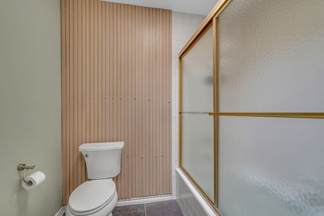 6433 Southpoint Dr, Dallas, TX 75248 - bathroom with toilet and wood walls