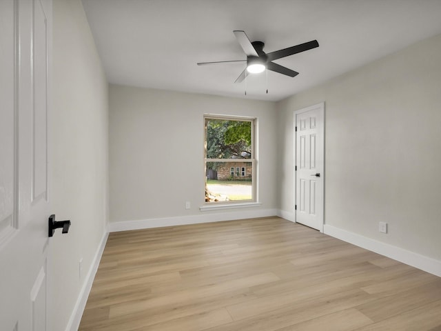 8521 Brookridge Dr, North Richland Hills, TX 76182 - empty room featuring ceiling fan and light wood finished floors