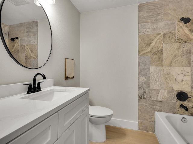 8521 Brookridge Dr, North Richland Hills, TX 76182 - bathroom featuring wood finished floors, vanity, and washtub / shower combination