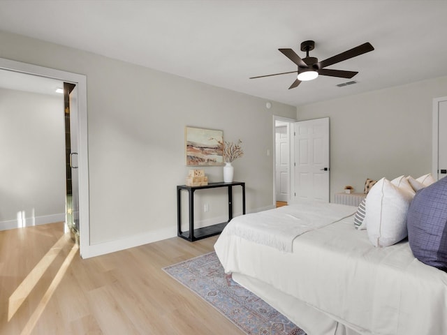 8521 Brookridge Dr, North Richland Hills, TX 76182 - bedroom with light wood-style flooring and ceiling fan