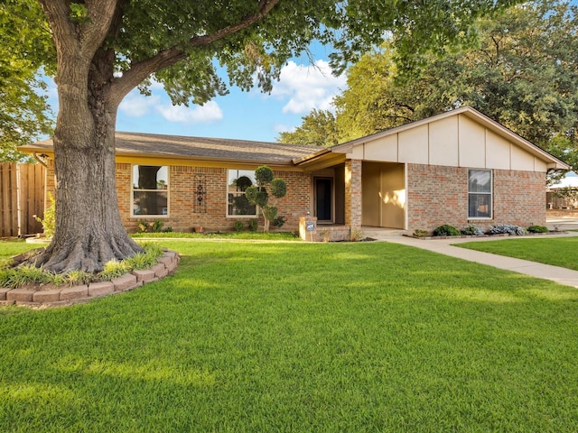 8521 Brookridge Dr, North Richland Hills, TX 76182 - view of front of property featuring brick siding and board and batten siding