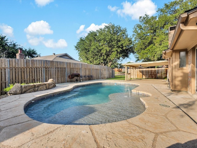 8521 Brookridge Dr, North Richland Hills, TX 76182 - view of swimming pool featuring a patio and a fenced backyard