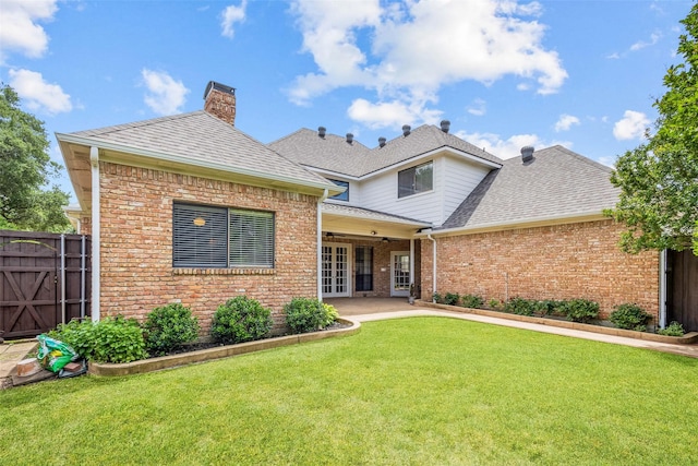 3213 Louis Dr, Plano, TX 75023 - back of property featuring a shingled roof, brick siding, a chimney, french doors, and a patio