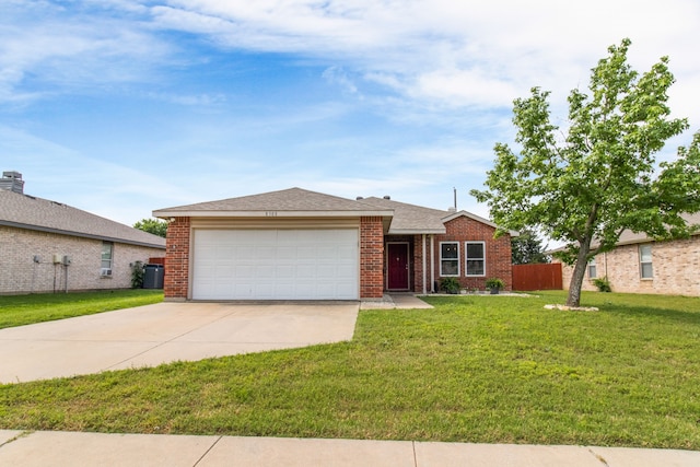 8308 Montecito Dr, Denton, TX 76210 - view of front of house featuring driveway, a garage, and brick siding