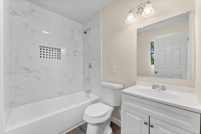 1008 Pleasant Dr, Dallas, TX 75217 - bathroom with wood finished floors, toilet, vanity, and shower / bathtub combination