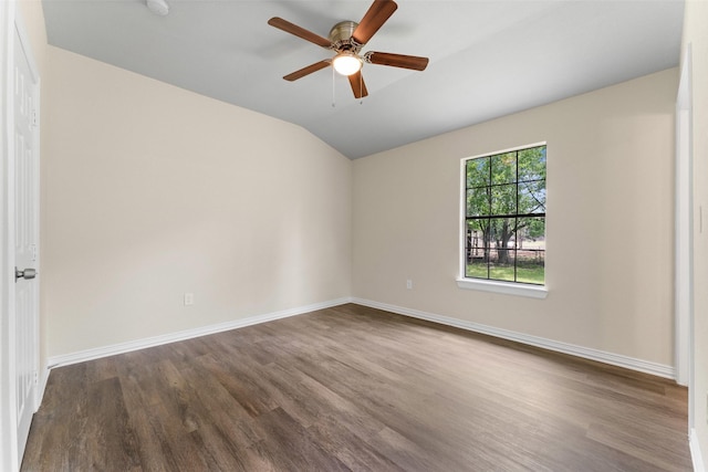 1008 Pleasant Dr, Dallas, TX 75217 - empty room featuring dark wood-style flooring, baseboards, lofted ceiling, and ceiling fan