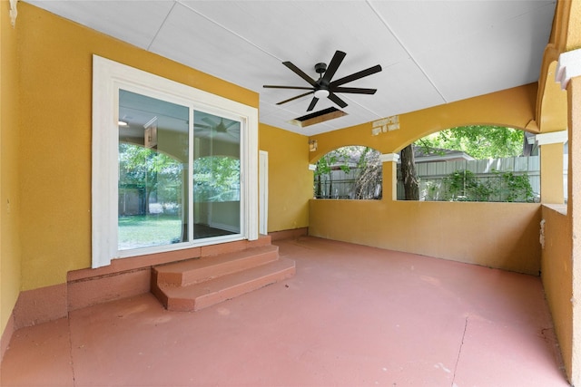 1008 Pleasant Dr, Dallas, TX 75217 - view of patio featuring ceiling fan, fence, and entry steps
