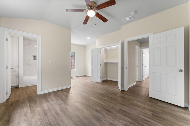 1008 Pleasant Dr, Dallas, TX 75217 - unfurnished bedroom with dark wood-style flooring, baseboards, vaulted ceiling, a closet, and recessed lighting