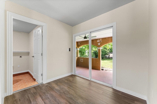 1008 Pleasant Dr, Dallas, TX 75217 - spare room with wood finished floors, baseboards, and a ceiling fan