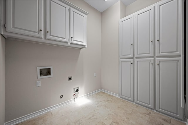 934 Hills Creek Dr, Mckinney, TX 75072 - laundry room with cabinet space, hookup for a gas dryer, electric dryer hookup, washer hookup, and baseboards