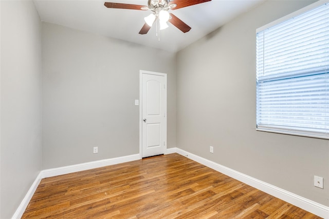 7418 Novella Dr, Fort Worth, TX 76134 - spare room with light wood finished floors, ceiling fan, plenty of natural light, and baseboards