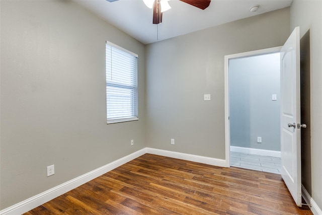 7418 Novella Dr, Fort Worth, TX 76134 - empty room with ceiling fan, wood finished floors, and baseboards
