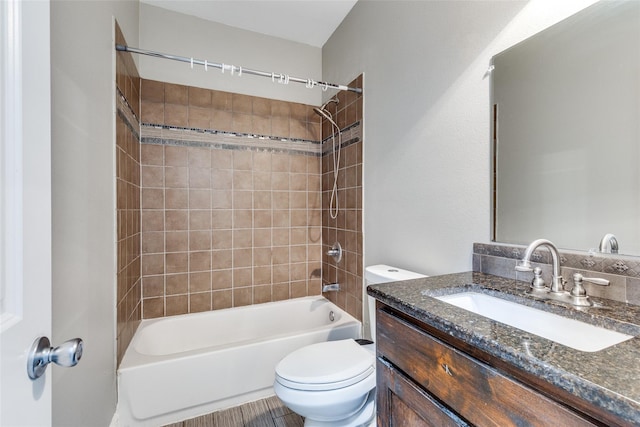 7418 Novella Dr, Fort Worth, TX 76134 - bathroom featuring toilet, washtub / shower combination, and vanity