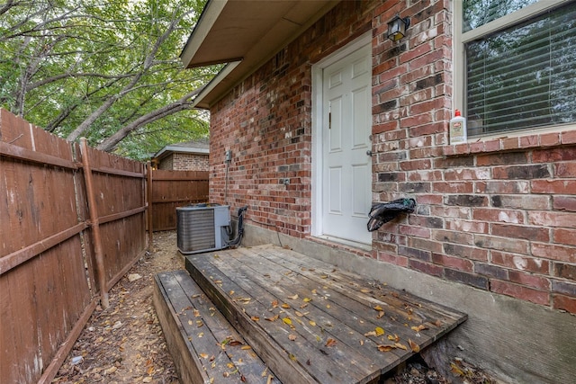 7418 Novella Dr, Fort Worth, TX 76134 - wooden terrace with central air condition unit and fence