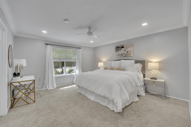 carpeted bedroom with ornamental molding, baseboards, recessed lighting, and ceiling fan