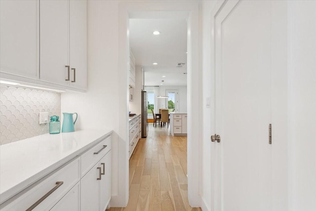 477 Willow Moon Ranch Rd, Crawford, TX 76638 - hall featuring recessed lighting and light wood-style floors