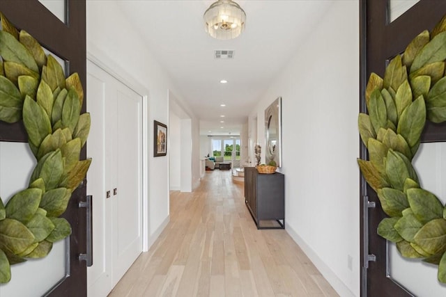 477 Willow Moon Ranch Rd, Crawford, TX 76638 - corridor with light wood finished floors, recessed lighting, and baseboards