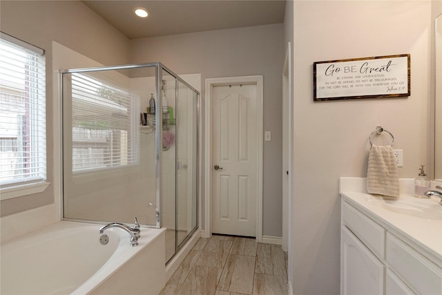 10617 Big Oak Dr, Fort Worth, TX 76131 - bathroom featuring a shower stall, healthy amount of natural light, a bath, vanity, and recessed lighting