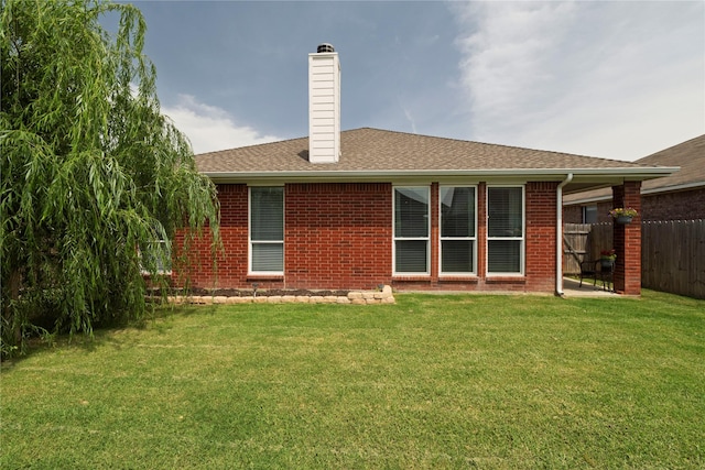 10617 Big Oak Dr, Fort Worth, TX 76131 - back of property featuring a chimney and brick siding
