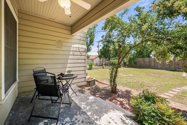 view of patio featuring a ceiling fan and central AC