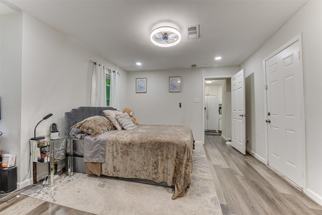 3444 Kellogg Ave, Dallas, TX 75216 - bedroom featuring light wood-style flooring, recessed lighting, and baseboards