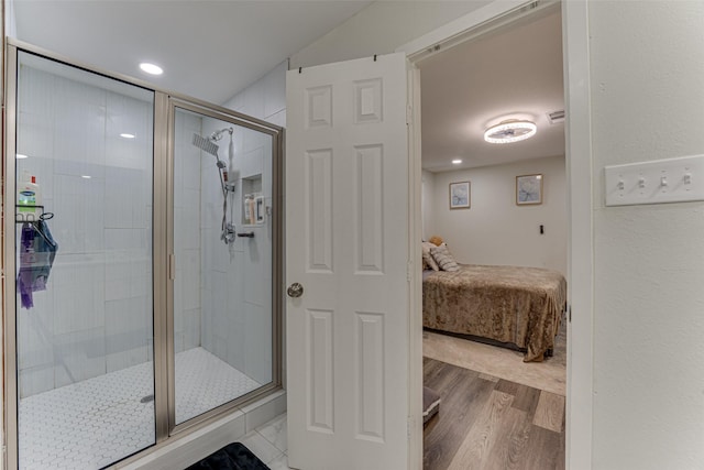 3444 Kellogg Ave, Dallas, TX 75216 - ensuite bathroom with a stall shower, wood finished floors, and recessed lighting