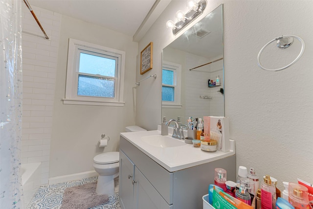 3444 Kellogg Ave, Dallas, TX 75216 - full bath with toilet, vanity, shower / bath combo with shower curtain, and tile patterned floors