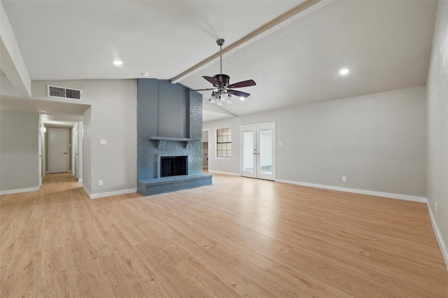 2833 Miller Pl, Mesquite, TX 75150 - unfurnished living room with a ceiling fan, baseboards, light wood-type flooring, a brick fireplace, and recessed lighting