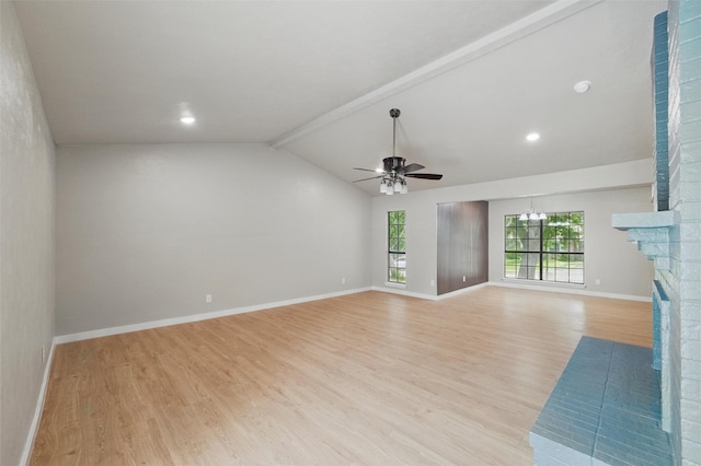2833 Miller Pl, Mesquite, TX 75150 - unfurnished living room featuring light wood-type flooring, ceiling fan, baseboards, a fireplace, and a chandelier