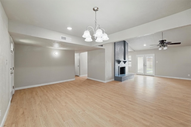 2833 Miller Pl, Mesquite, TX 75150 - unfurnished living room featuring a fireplace, baseboards, light wood-style floors, a chandelier, and recessed lighting