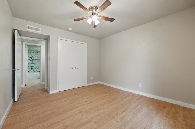 2833 Miller Pl, Mesquite, TX 75150 - unfurnished bedroom featuring light wood-type flooring, baseboards, a closet, and a ceiling fan