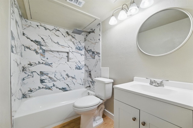 2833 Miller Pl, Mesquite, TX 75150 - bathroom with wood finished floors, vanity, bathing tub / shower combination, toilet, and baseboards
