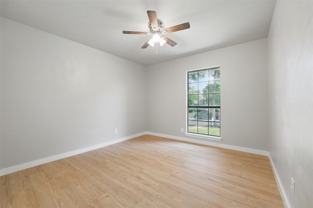 2833 Miller Pl, Mesquite, TX 75150 - empty room featuring light wood-style floors, a ceiling fan, and baseboards
