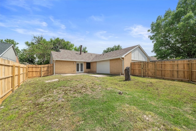 2833 Miller Pl, Mesquite, TX 75150 - back of property featuring french doors, brick siding, and a patio area