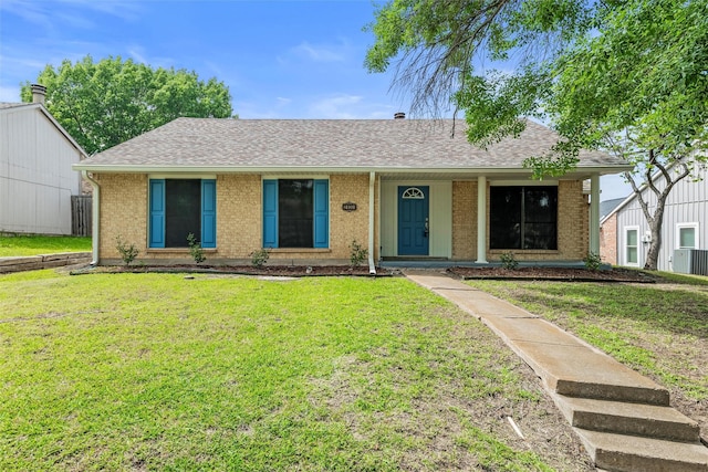 2833 Miller Pl, Mesquite, TX 75150 - single story home with a shingled roof, a front lawn, brick siding, and central air condition unit