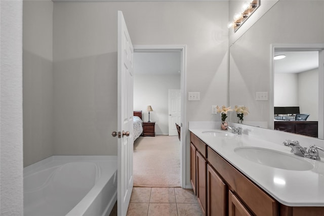 2336 Bermont Red Ln, Fort Worth, TX 76131 - bathroom featuring connected bathroom, a garden tub, tile patterned floors, and double vanity