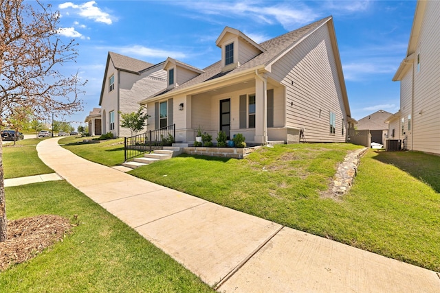 1413 Horizon Way, Northlake, TX 76247 - view of front of property with roof with shingles, a front lawn, and cooling unit