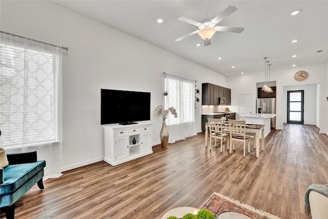 1413 Horizon Way, Northlake, TX 76247 - living area with light wood-style flooring, ceiling fan, recessed lighting, and baseboards