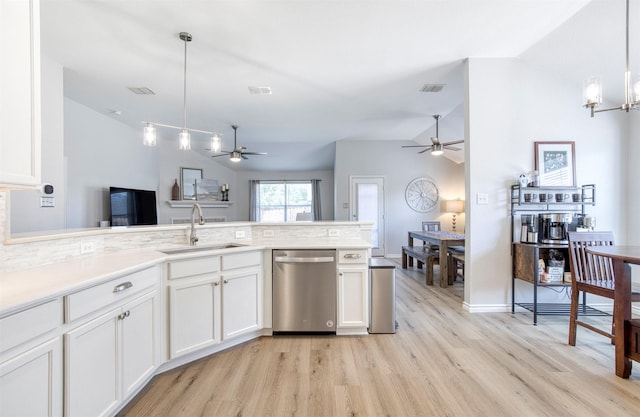 2836 Dawn Spring Dr, Little Elm, TX 75068 - kitchen featuring stainless steel dishwasher, a ceiling fan, lofted ceiling, light wood-type flooring, and a sink