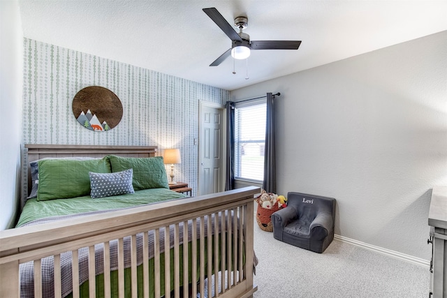 2836 Dawn Spring Dr, Little Elm, TX 75068 - bedroom featuring baseboards, wallpapered walls, carpet floors, and a ceiling fan